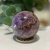Amethyst sphere with white chevron banding, 73mm 489g, purple amethyst with a red jasper band, Mystic Grove UK