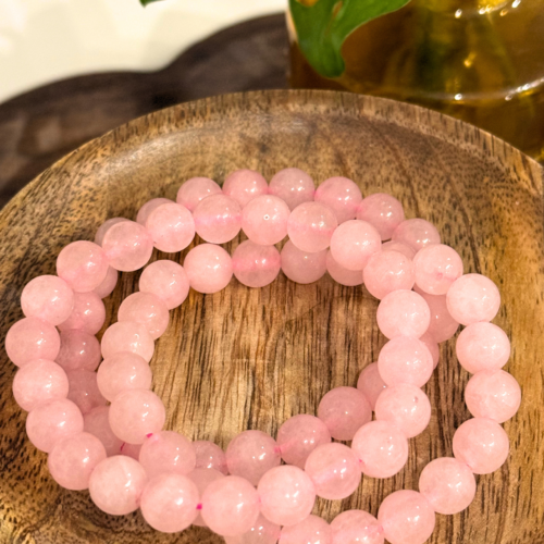 Pink rose quartz crystal bracelet, polished beads on stretch cord, hand selected for heart chakra and self love work.