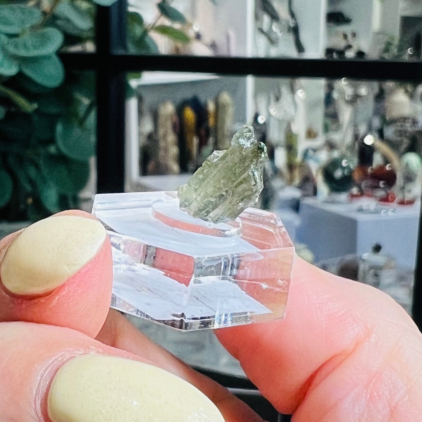 Moldavite Raw Stone 0.45g Czech Tektite C1 3 Moldavite raw stone C1 upright on the clear hexagonal base showing the twin pointed top, 0.45g from the Chlum sand mine One flag. Publishing your per gram rate on C1 is good for trust and it answers a real search, but it does commit you publicly. If you would rather keep the rate off the site, say so and I will rewrite that section to answer the question in ranges instead.