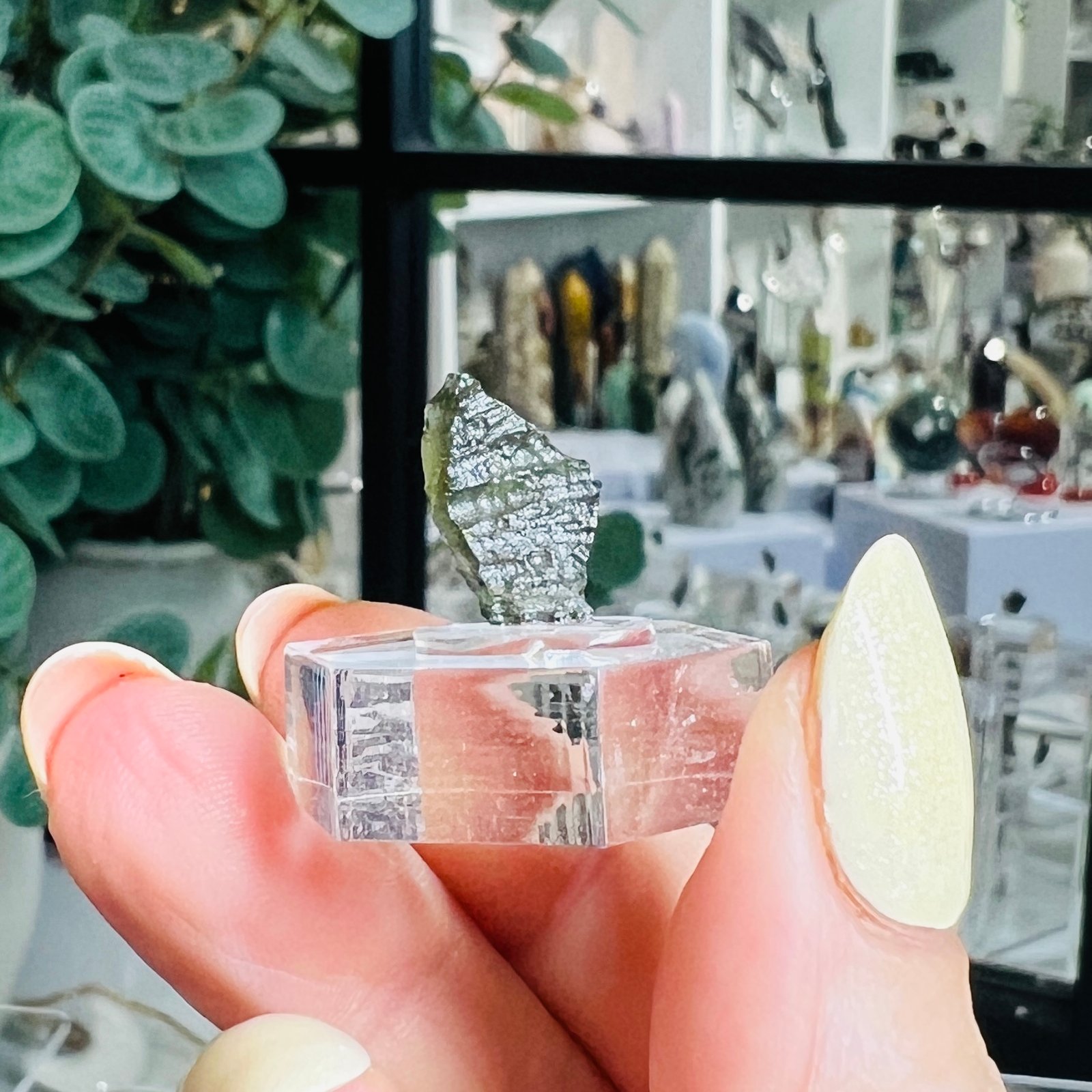 Raw Moldavite Piece 0.54g Czech Tektite C4 4 Raw moldavite piece C4 standing upright on the clear hexagonal base, 0.54g from the Chlum sand mine