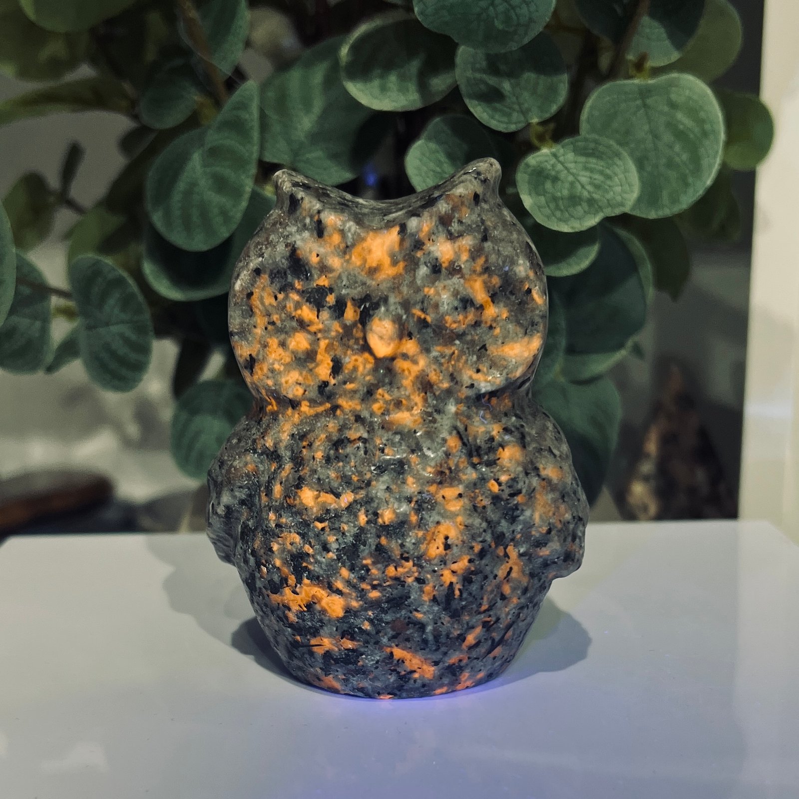 Yooperlite Owl Carving 9cm UV Reactive 1 Yooperlite owl glowing bright orange under 365nm UV light
