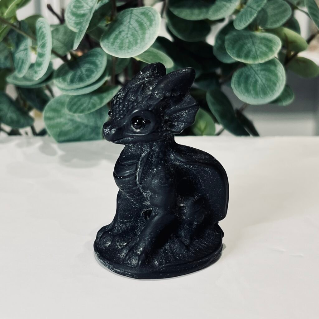 Black obsidian dragon carving 8cm, glossy black sitting dragon with set eyes, Mystic Grove UK