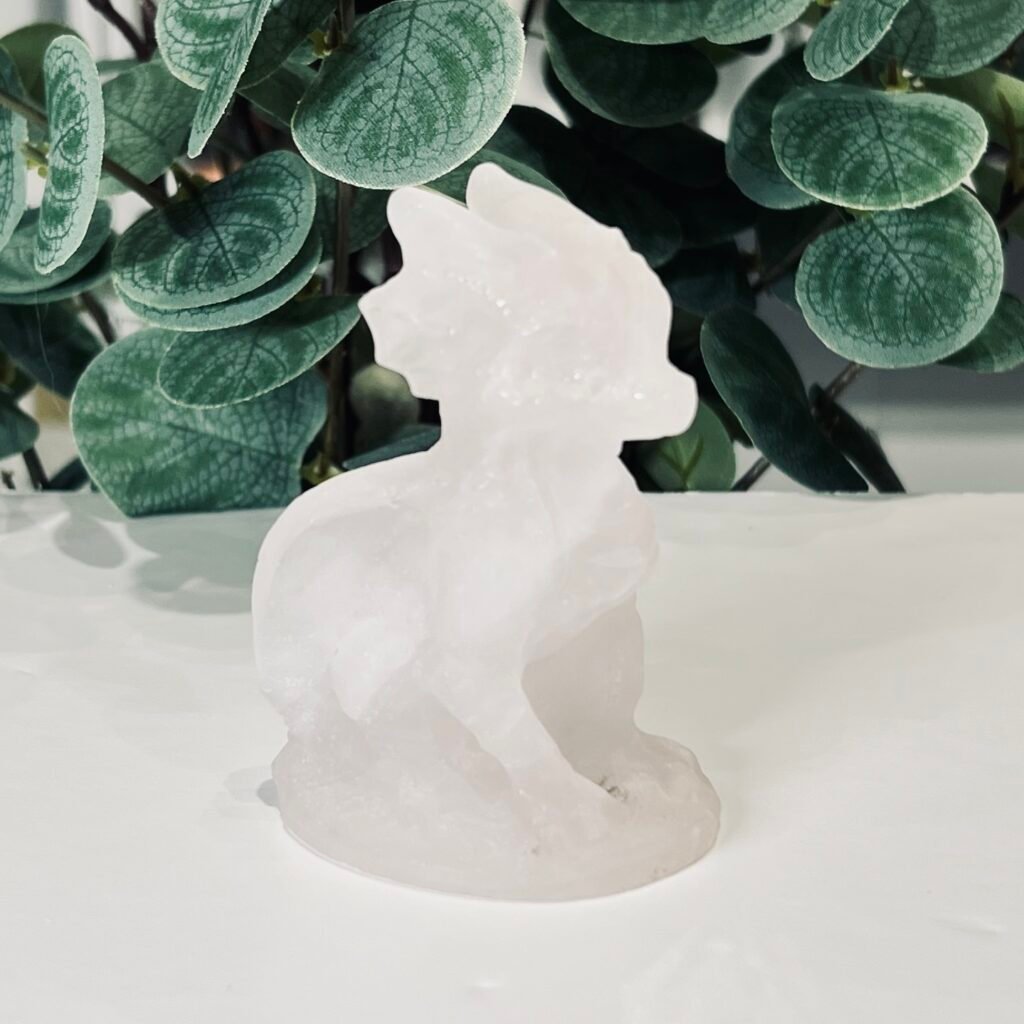Rose quartz dragon carving 8cm, pale pink sitting dragon with raised crest, Mystic Grove UK