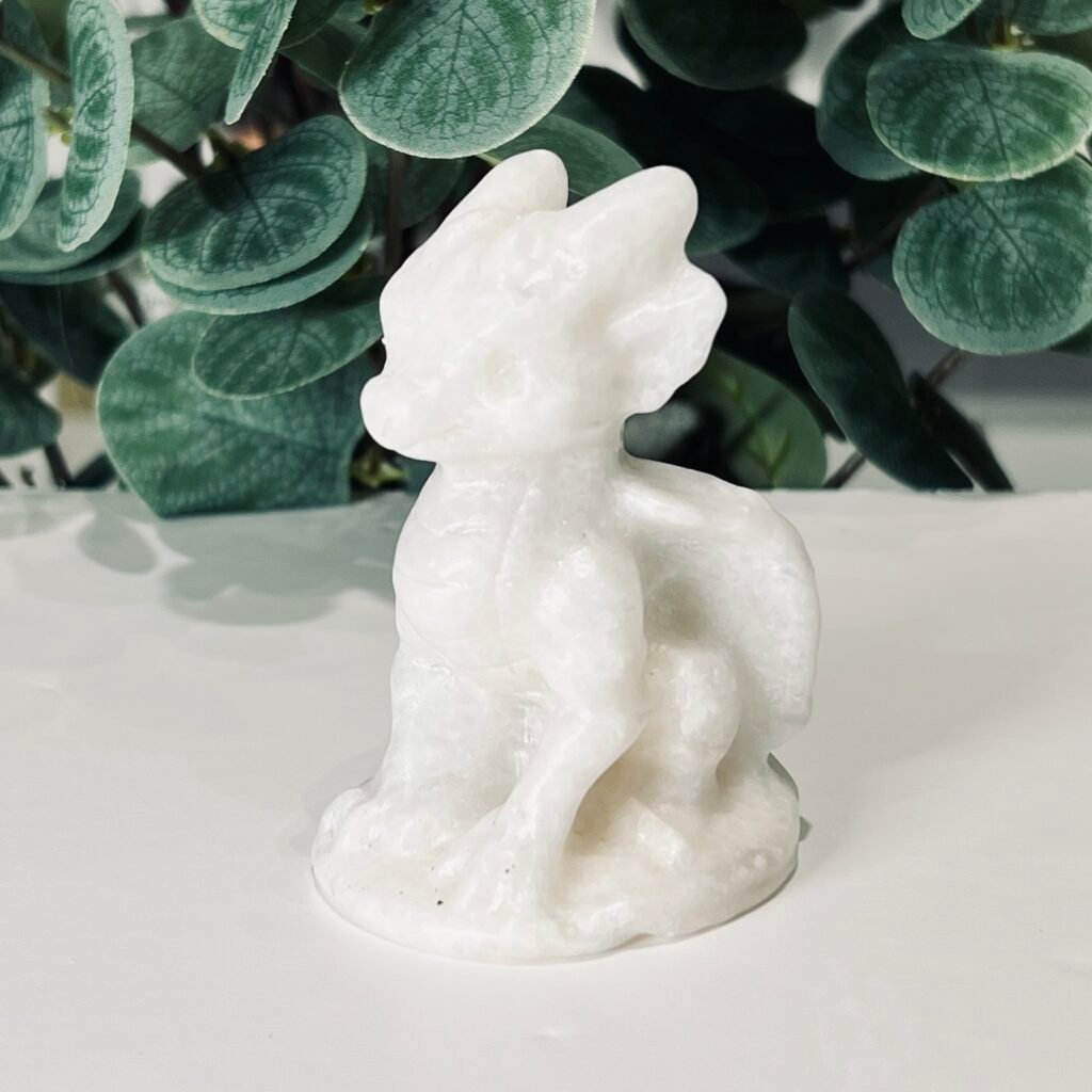 White jade dragon carving 8cm, opaque white sitting dragon with raised crest, Mystic Grove UK