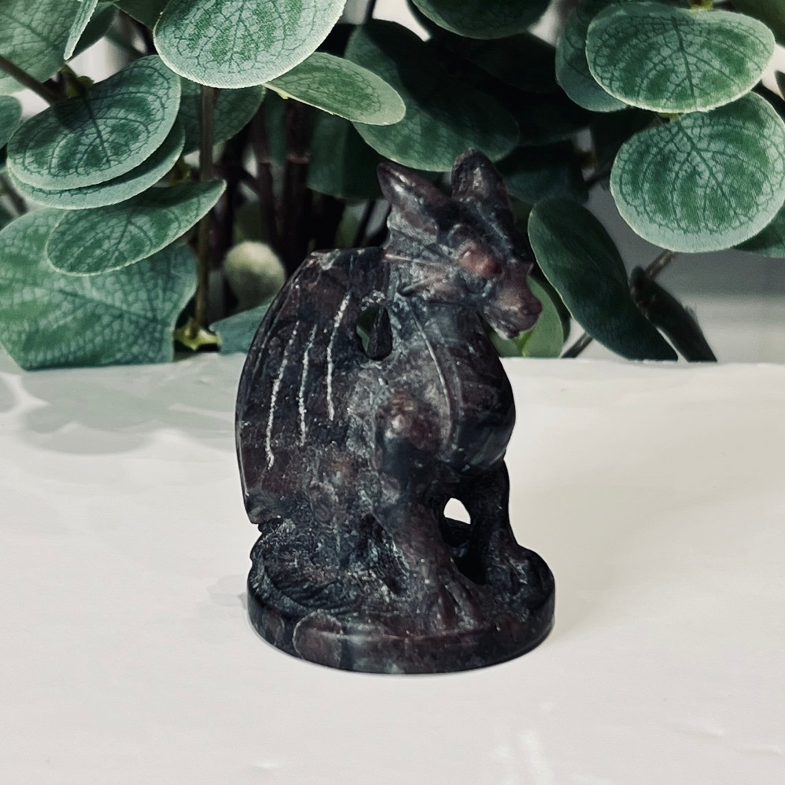 Garnet Dragon Carving 7cm 5 Garnet dragon carving 7cm, dark standing dragon with red garnet through the stone, Mystic Grove UK