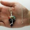 Amethyst chakra pendulum wrapped with seven chakra stones view 2