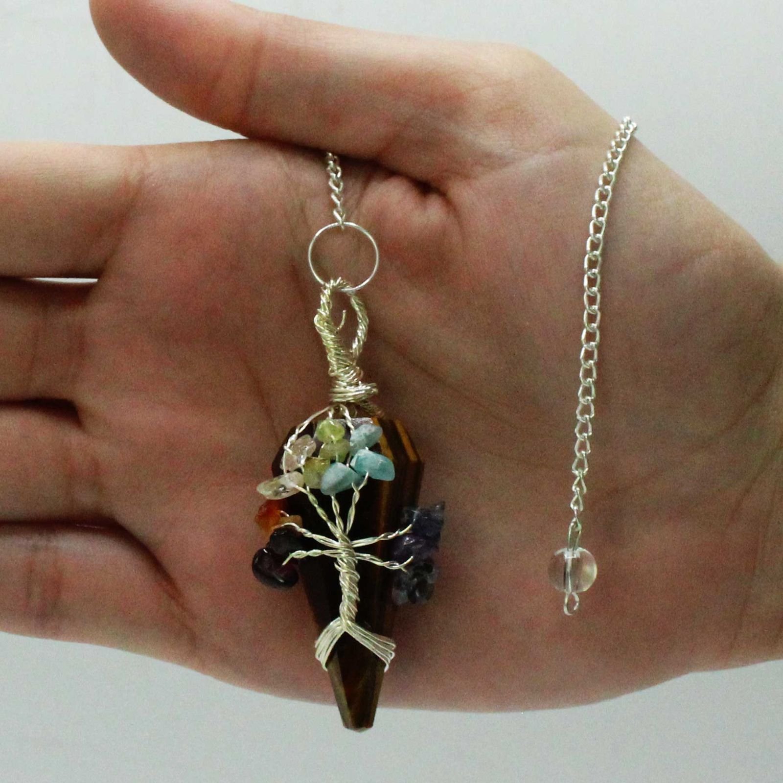 Tigers Eye chakra pendulum wrapped with seven chakra stones view 2