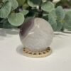 Banded Agate Sphere 54mm Banded agate sphere showing soft lavender grey banding