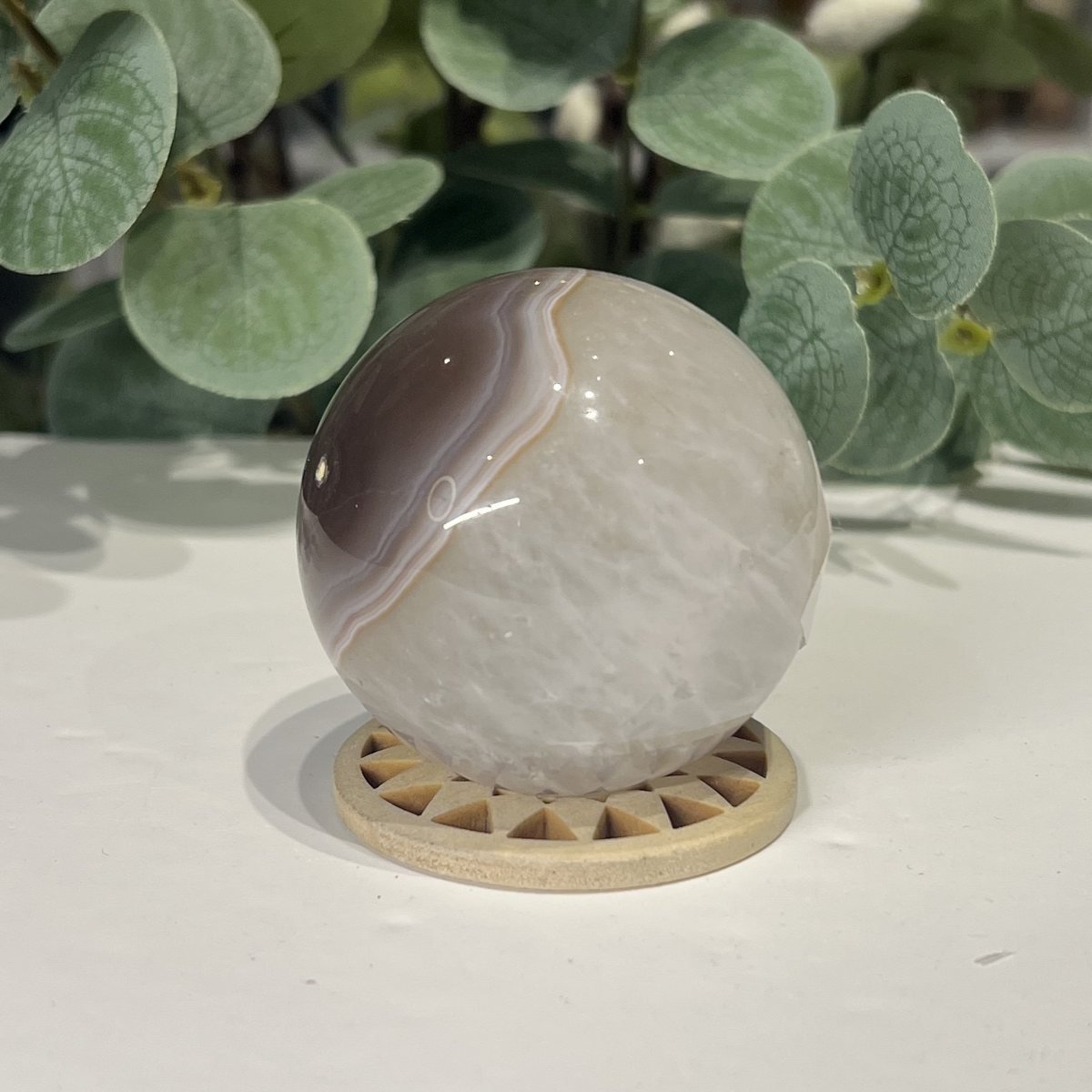 Banded Agate Sphere 54mm Banded agate sphere showing soft lavender grey banding