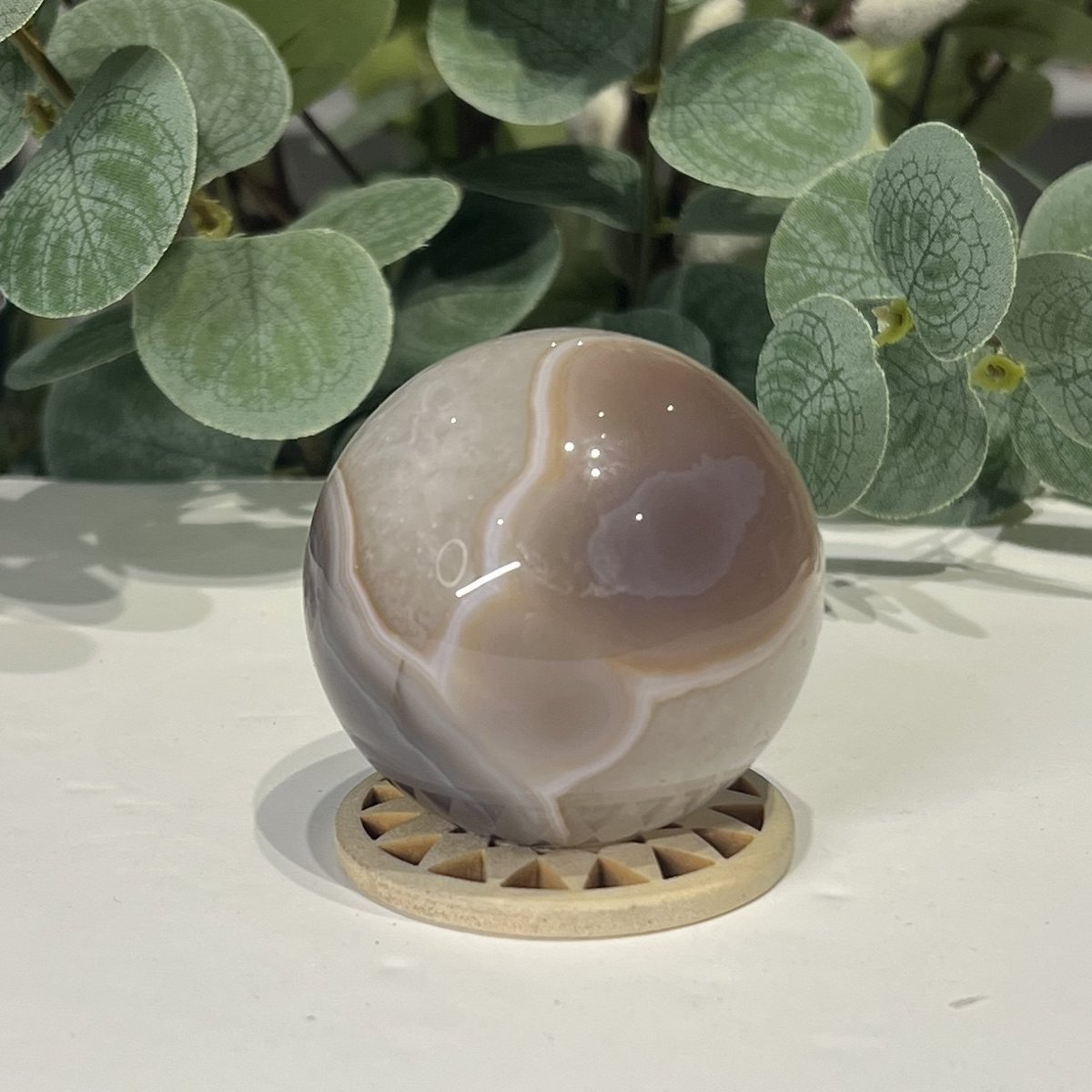 Banded Agate Sphere 54mm Banded agate sphere second side showing crystalline quartz