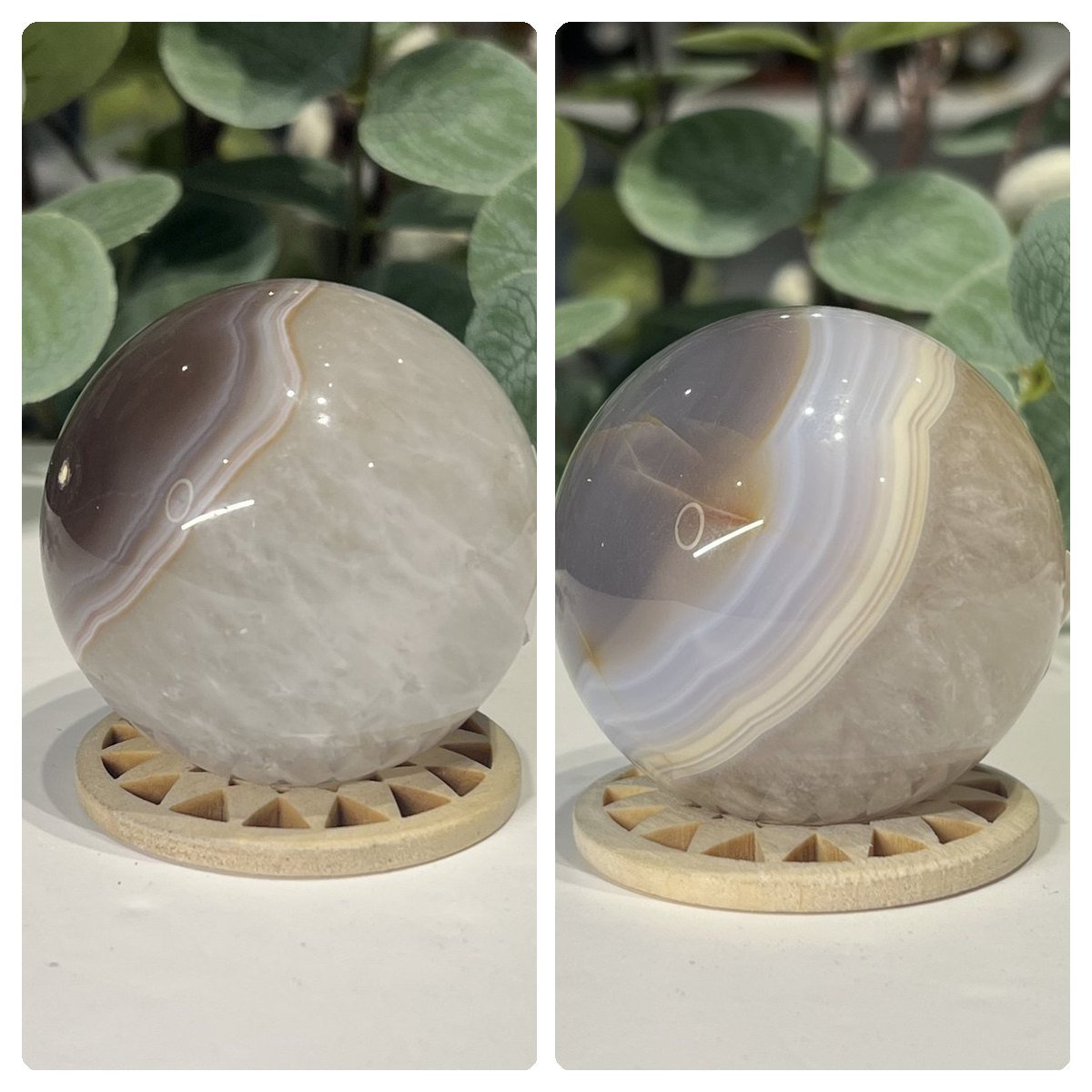 Banded Agate Sphere 54mm Banded agate sphere 54mm on a wooden stand, grey and cream bands around a clear quartz centre, Mystic Grove UK