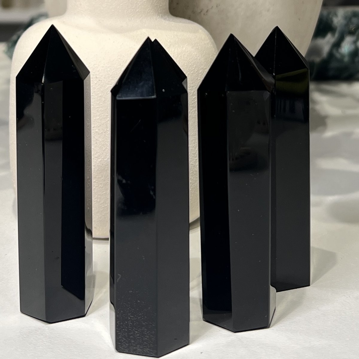Small black obsidian towers, polished obsidian points