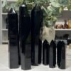 Black obsidian towers, large and small polished obsidian points together