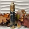 Black ocean jasper tower D Black ocean jasper tower D, black with orange and ochre, polished tower