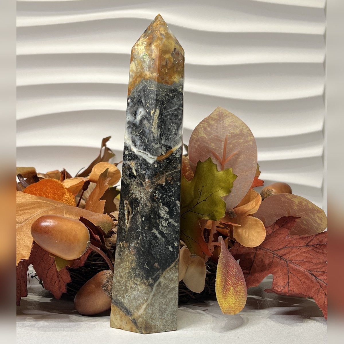 Black ocean jasper tower D Black ocean jasper tower D, black with orange and ochre, polished tower