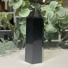 Black Tourmaline Tower 14cm to 17cm Black tourmaline tower close view of the polished faces and soft sheen