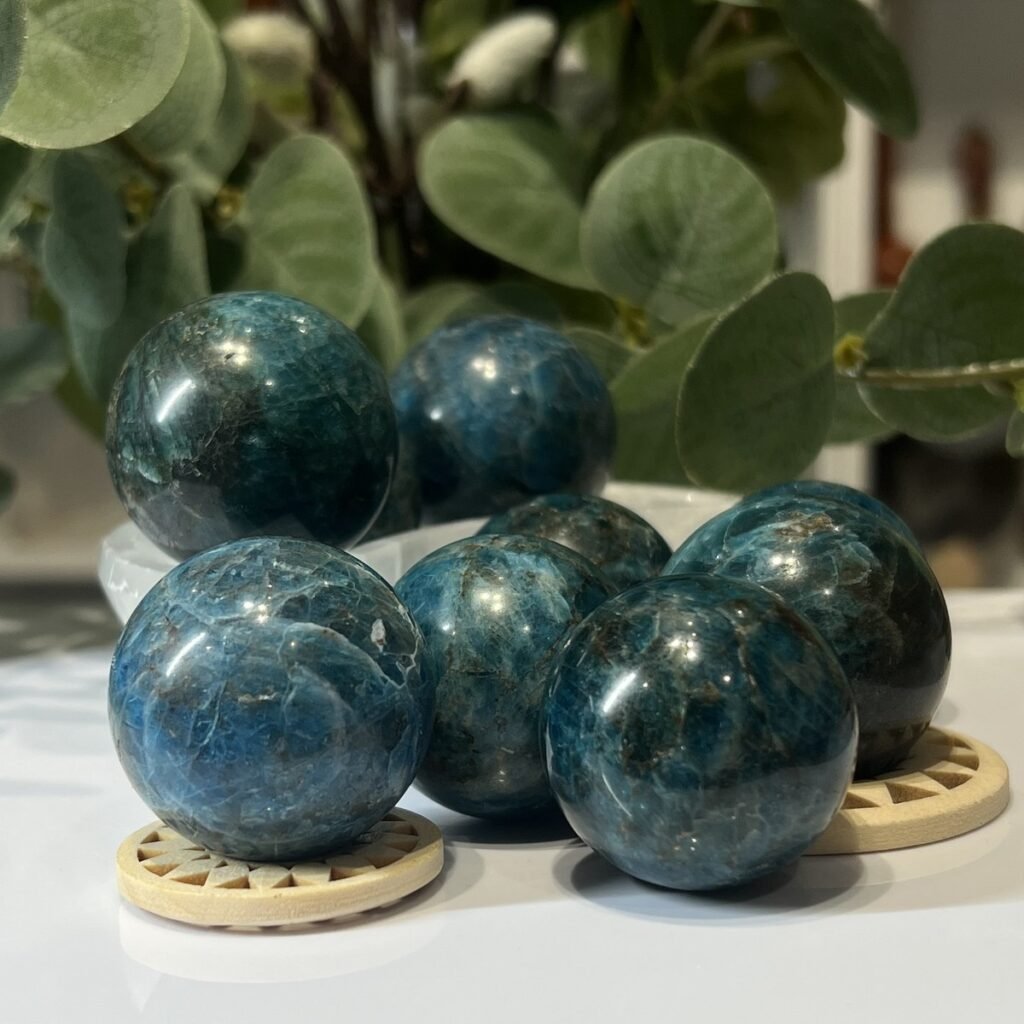 Home 2026 35 Group of blue apatite spheres, 30mm to 35mm, on wooden stands