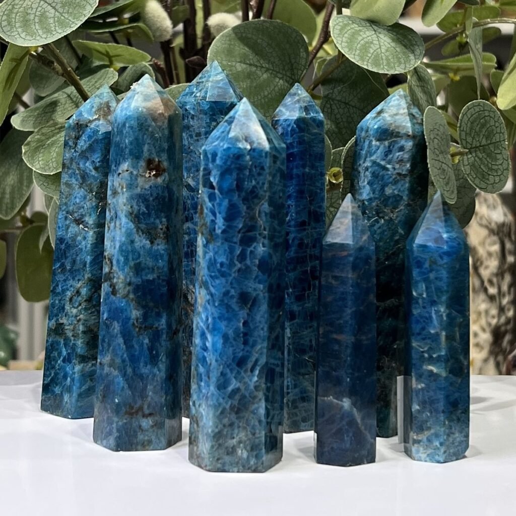 Blue apatite towers, group of polished six sided points