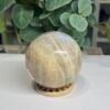 blue flash moonstone sphere 7cm 2 Blue flash moonstone sphere 7cm showing silky lines and a soft blue sheen