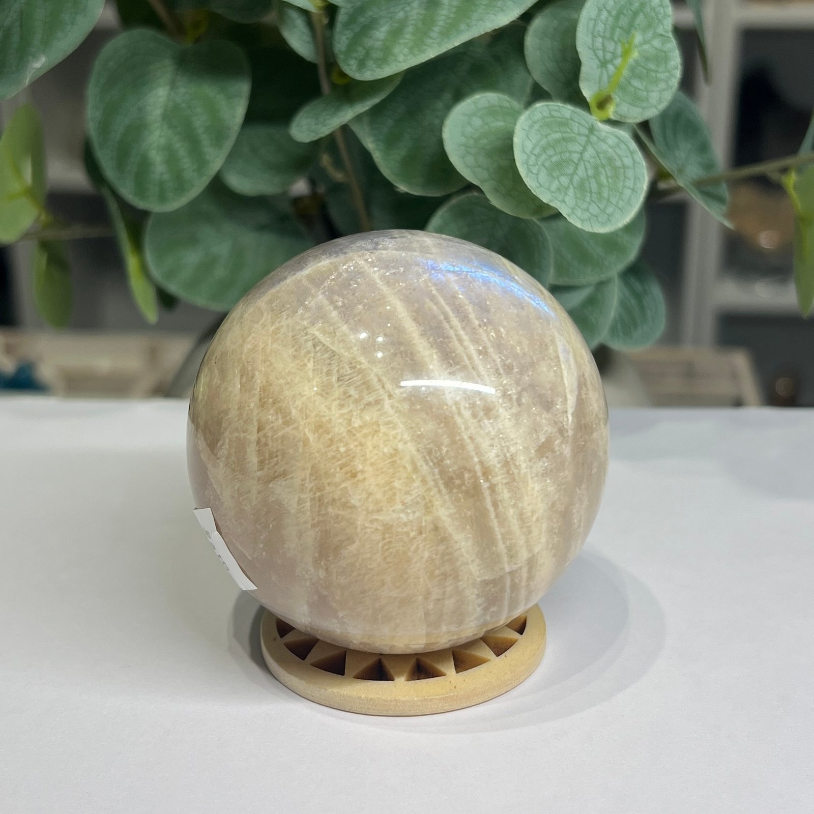 blue flash moonstone sphere 7cm 2 Blue flash moonstone sphere 7cm showing silky lines and a soft blue sheen