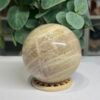 blue flash moonstone sphere 7cm 3 Blue flash moonstone sphere 7cm, peach and cream with fine silky banding