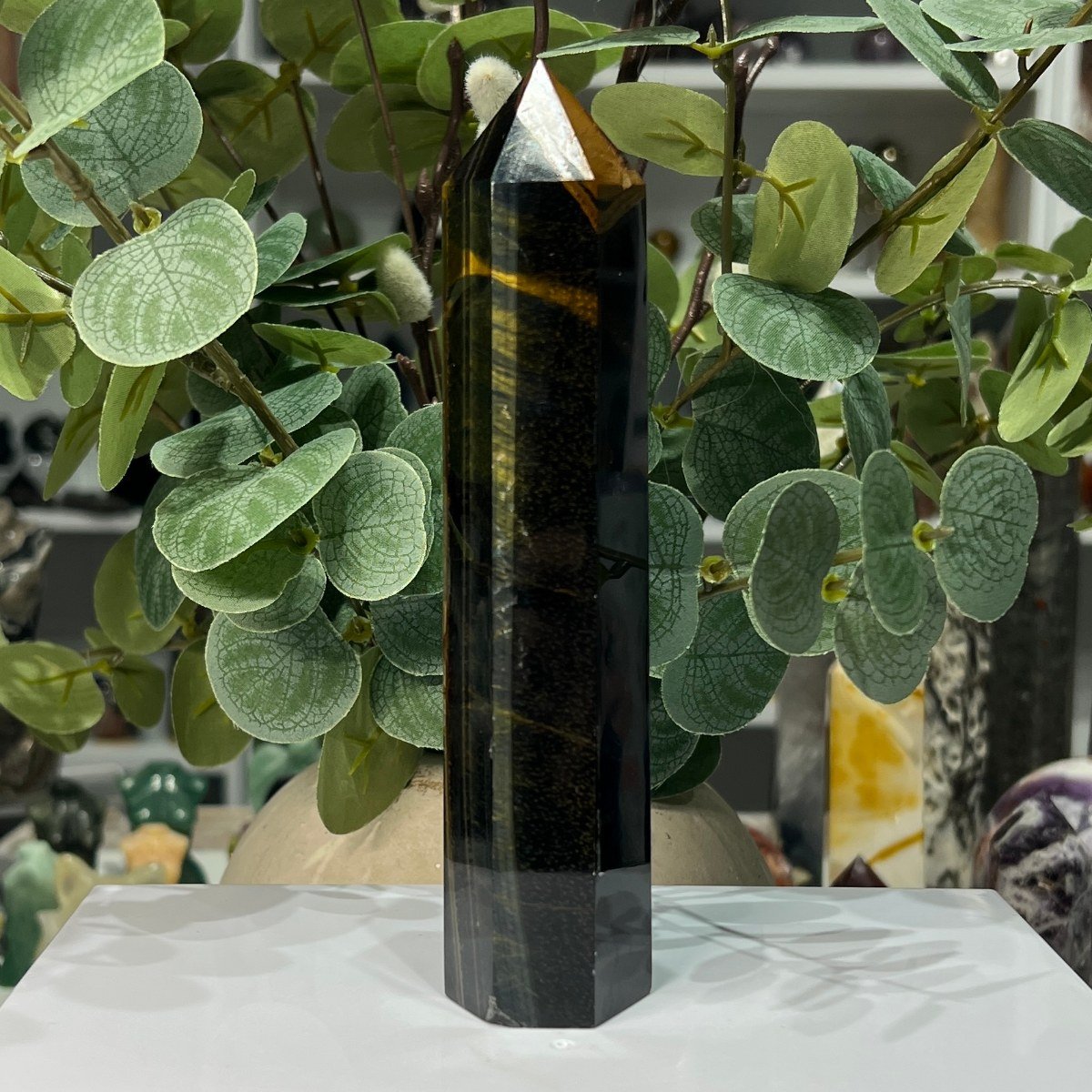 Blue tigers eye tower point with gold flash