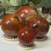 Carnelian spheres Carnelian spheres, a group of polished pieces together