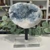 Celestite Geode on Stand 2.6kg Celestite geode close view of the pale blue crystals inside the cavity
