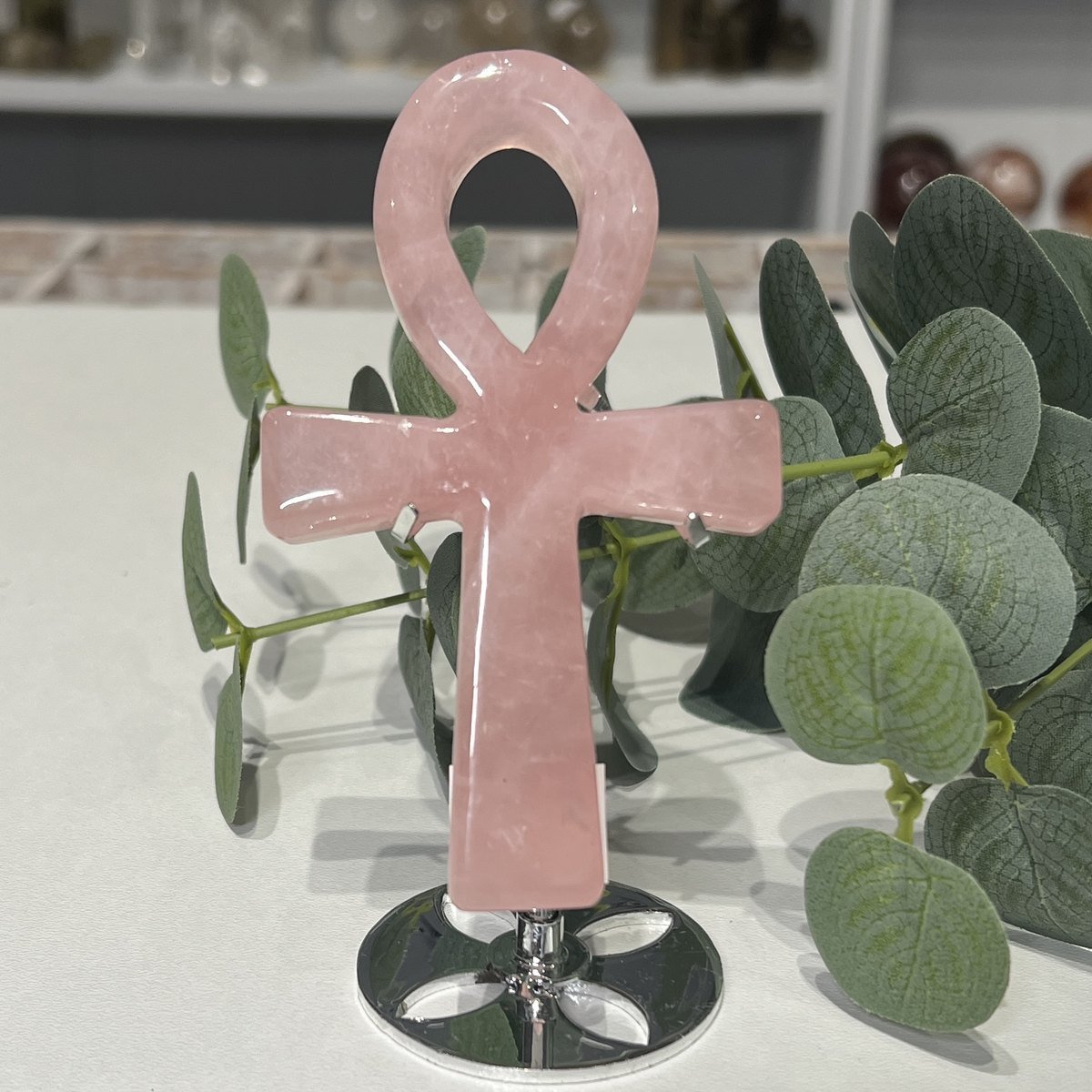 Crystal Ankh on Stand Rose Quartz Rose quartz crystal ankh 13cm on a silver stand, soft pink