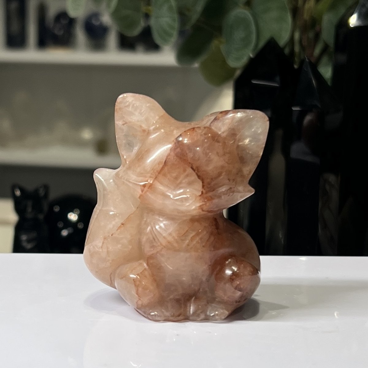 Fire Quartz fox carving 6cm Fire Quartz fox carving 6cm, carved and polished sitting crystal fox