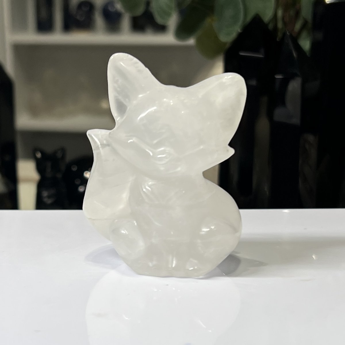 Clear Quartz fox carving 6cm Clear Quartz fox carving 6cm, carved and polished sitting crystal fox