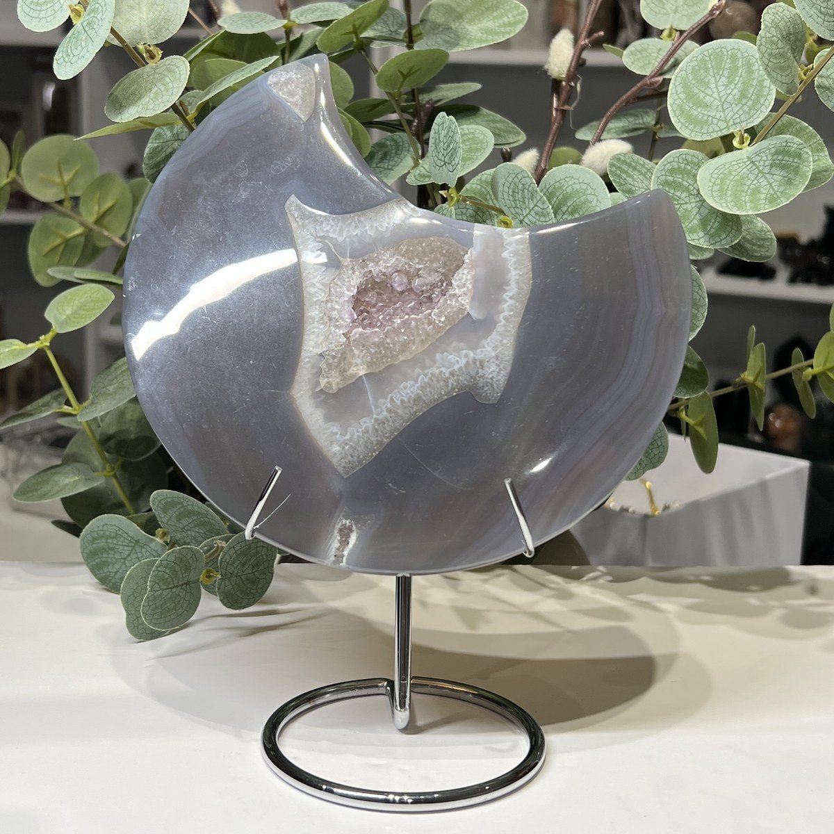 Agate crystal moon A with amethyst druzy on a silver stand, 17cm Agate crystal moon A with amethyst druzy on a silver stand, 17cm
