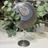 Agate crystal moon B with crystal druzy on a silver stand, 14cm Agate crystal moon B with crystal druzy on a silver stand, 14cm