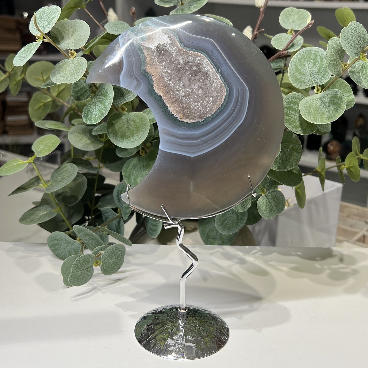 Agate crystal moon B with crystal druzy on a silver stand, 14cm Agate crystal moon B with crystal druzy on a silver stand, 14cm