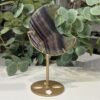 Rainbow fluorite crystal moon D on a gold stand, 10cm Rainbow fluorite crystal moon D on a gold stand, 10cm