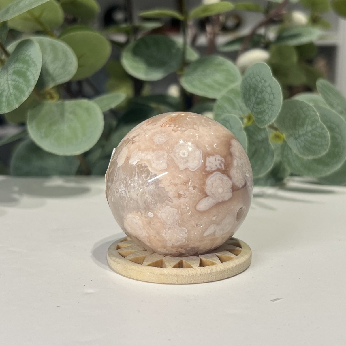 Flower Agate Sphere 49mm Flower agate sphere second side showing translucent peach agate