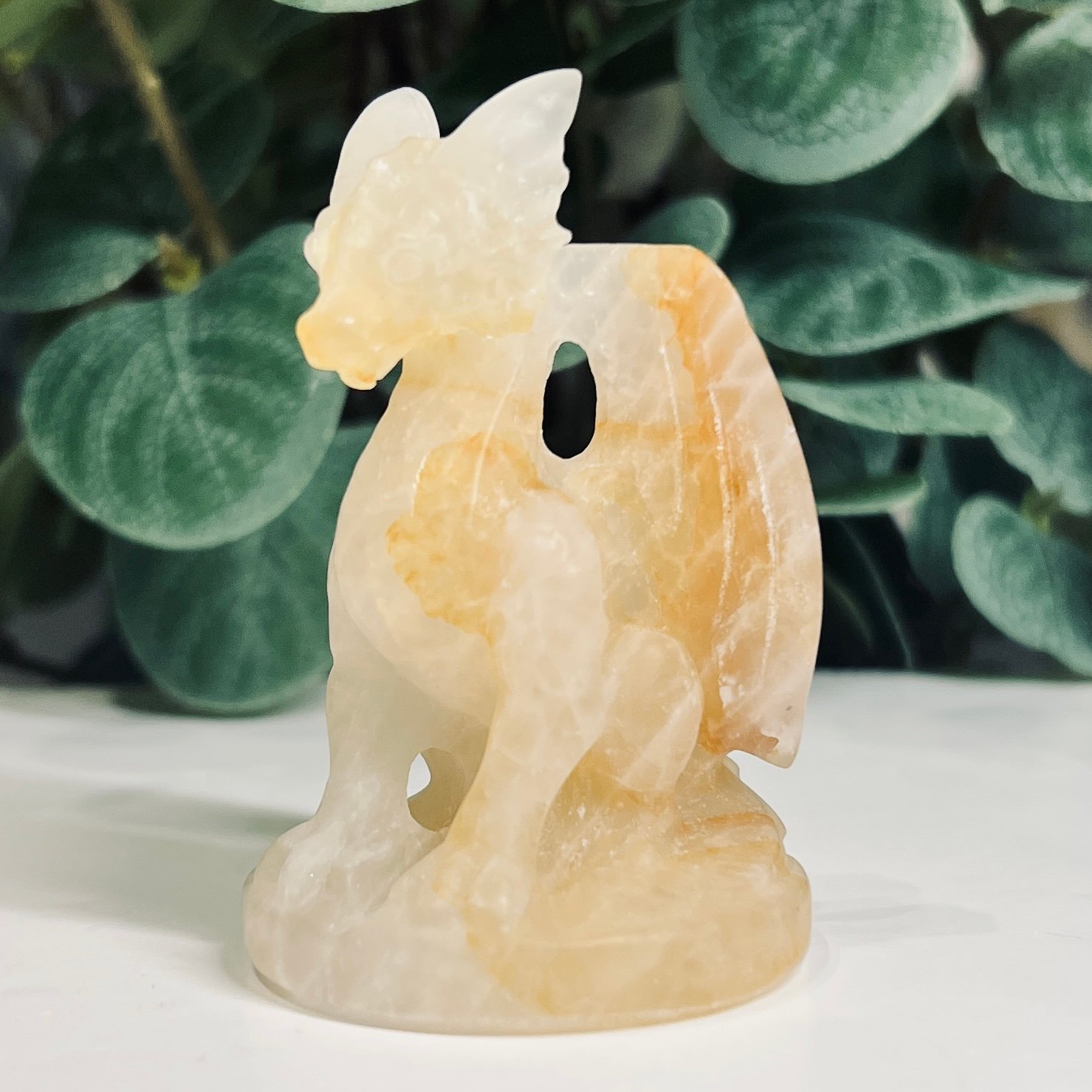 Honey calcite dragon carving 7cm Honey calcite dragon carving 7cm