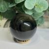 Gold sheen obsidian sphere C, 62mm, with deep bands of golden sheen Gold sheen obsidian sphere C, 62mm, with deep bands of golden sheen