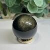 Gold sheen obsidian sphere D, 55mm, with fine glittering gold sheen Gold sheen obsidian sphere D, 55mm, with fine glittering gold sheen