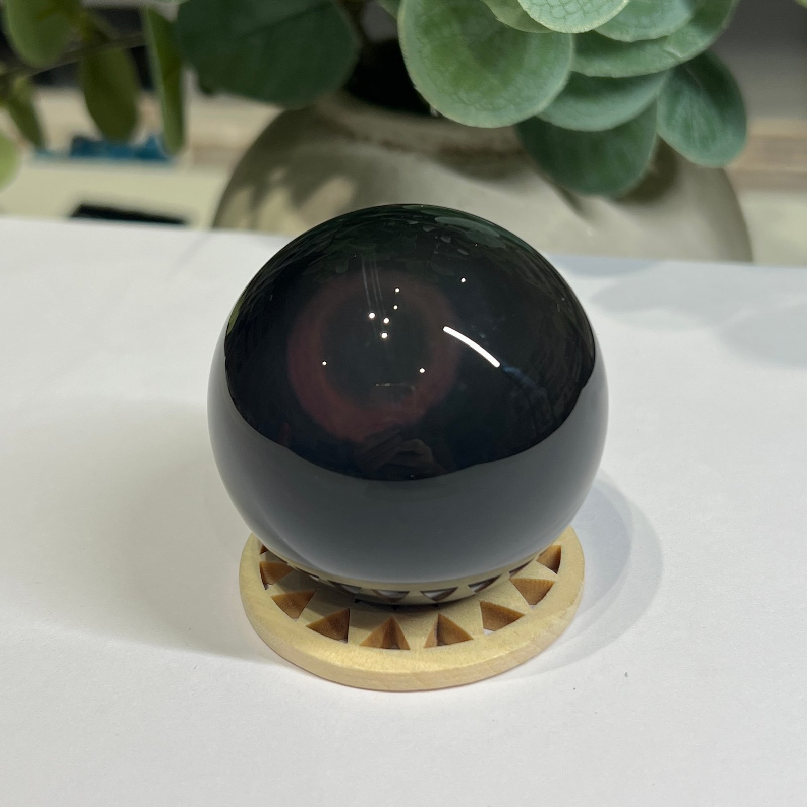 Rainbow obsidian sphere 53mm with a red and purple bullseye ring Rainbow obsidian sphere 53mm with a red and purple bullseye ring