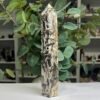 Specularite quartz tower 20cm back view with dense black and brown specularite Specularite quartz tower 20cm back view with dense black and brown specularite