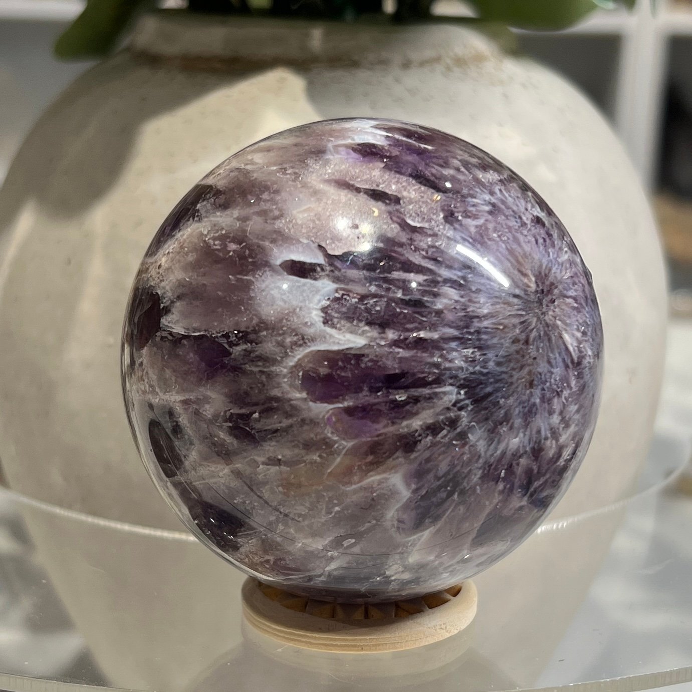 Dream amethyst sphere C 70mm with sunburst flower pattern Dream amethyst sphere C 70mm with sunburst flower pattern