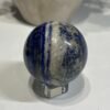 Lapis lazuli sphere B 58mm with cream calcite stripe Lapis lazuli sphere B 58mm with cream calcite stripe
