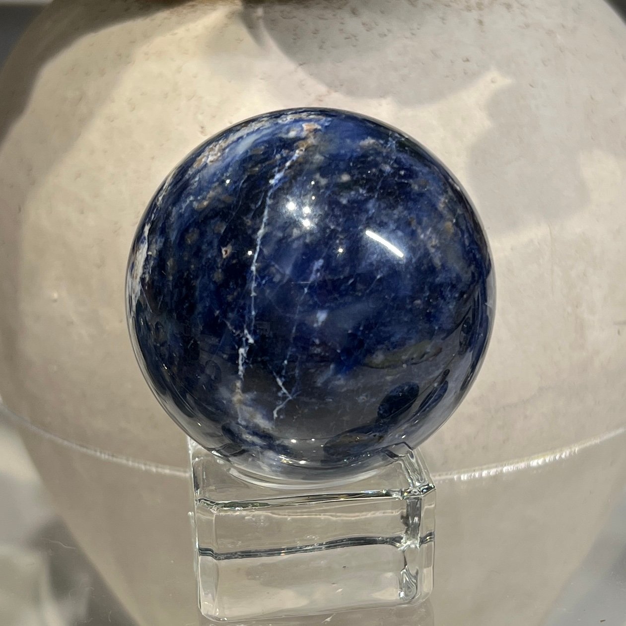 Sodalite sphere B 53mm, deep inky blue with fine white vein Sodalite sphere B 53mm, deep inky blue with fine white vein