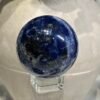 Sodalite sphere C 53mm, dark navy with blue and white patch Sodalite sphere C 53mm, dark navy with blue and white patch