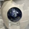 Sodalite sphere F 46mm, dark blue with pale white patch Sodalite sphere F 46mm, dark blue with pale white patch