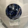 Sodalite sphere G 42mm, blue with peach and tan patches Sodalite sphere G 42mm, blue with peach and tan patches
