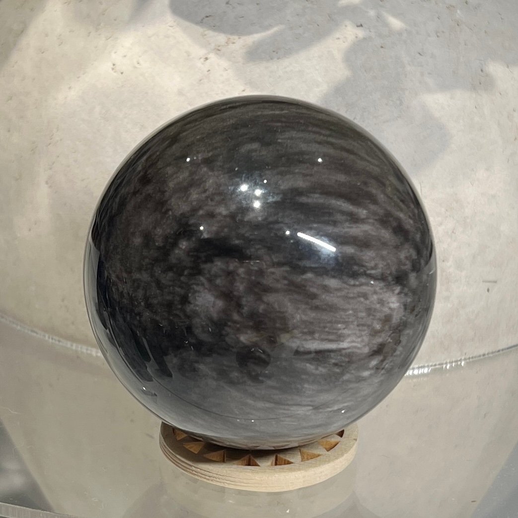 Silver sheen obsidian sphere F 58mm with silvery banded sheen Silver sheen obsidian sphere F 58mm with silvery banded sheen