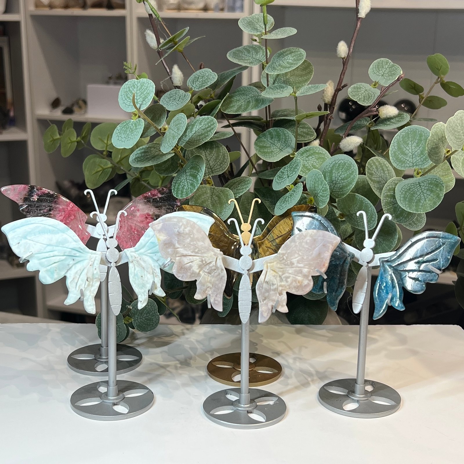 Crystal butterfly wings on stands in five stones Crystal butterfly wings on stands in five stones
