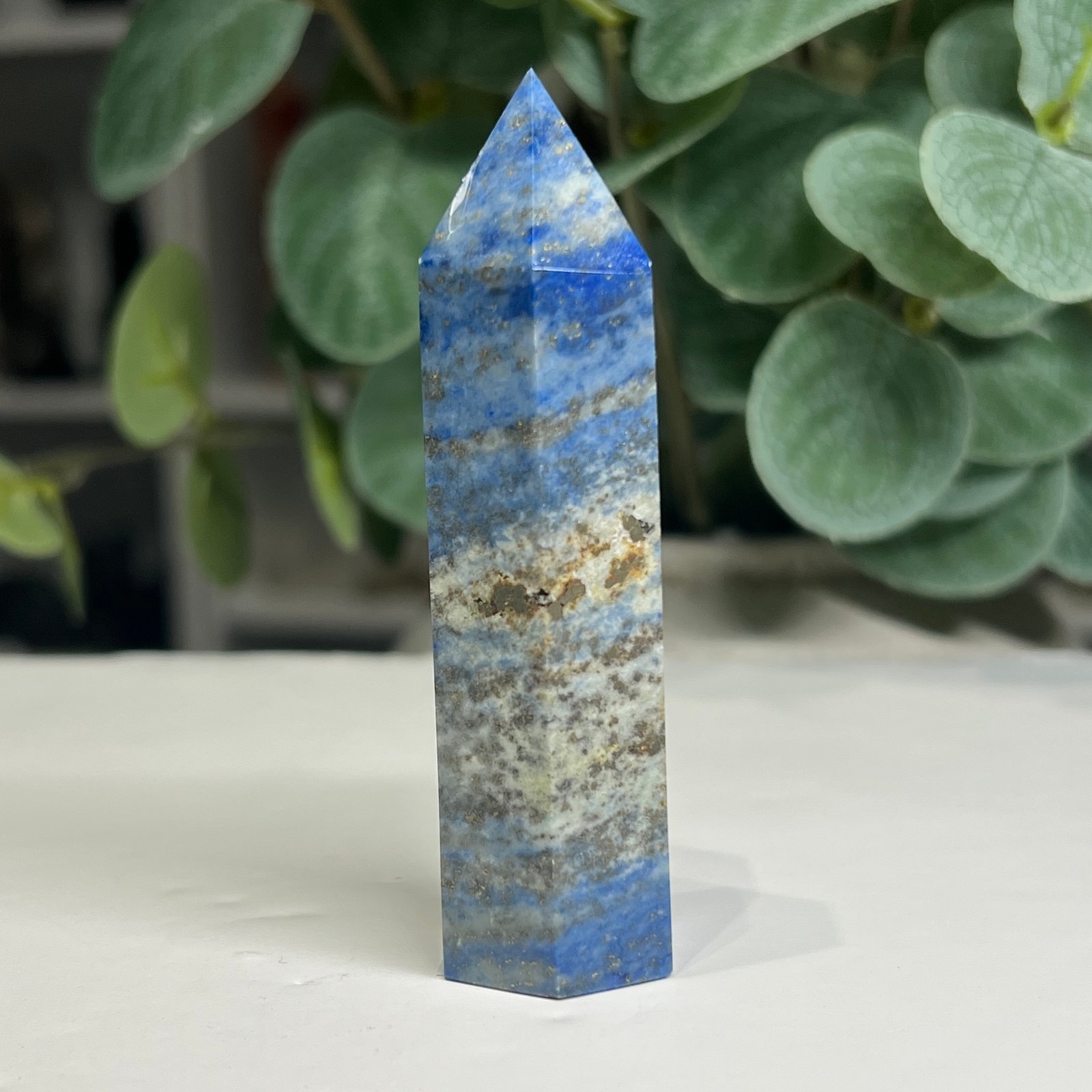 lapis lazuli tower c 7cm Lapis lazuli tower C 7cm, pale blue with gold pyrite patches